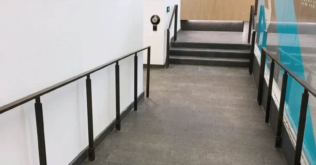 Bank of Canada, Ottawa: Black steel guardrail along a ramp that leads to a short stair