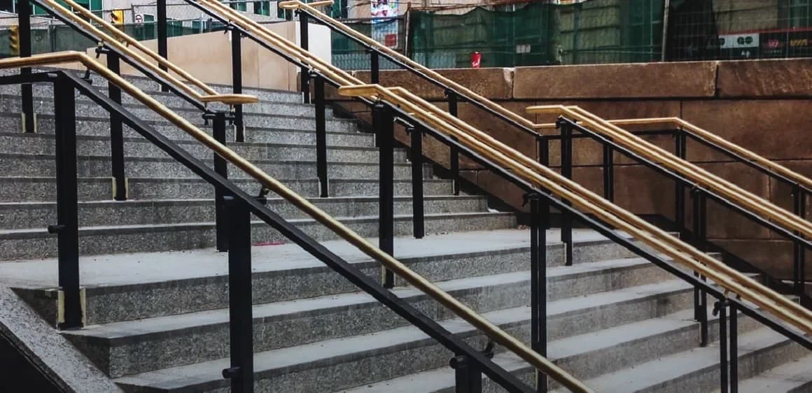 Union Station, Toronto: Exterior stair runs with black posts and bronze top rails